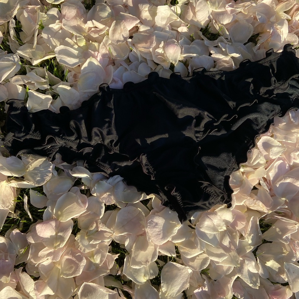 Black swimsuit bottoms.